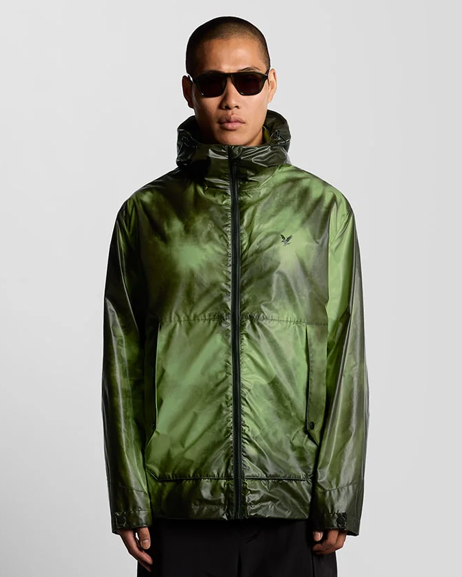 Man wears Heat Reactive Shell Jacket in Dark Sediment/Laser Beam
