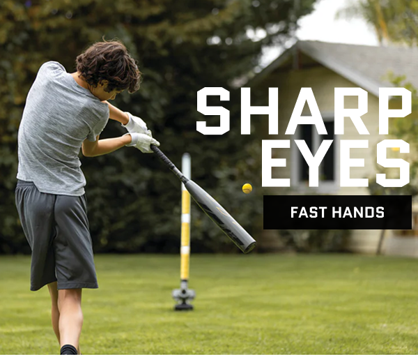 Sharp eyes, fast hands. Kid hitting a baseball