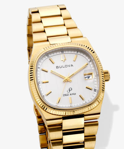 Gold Bulova watch. 