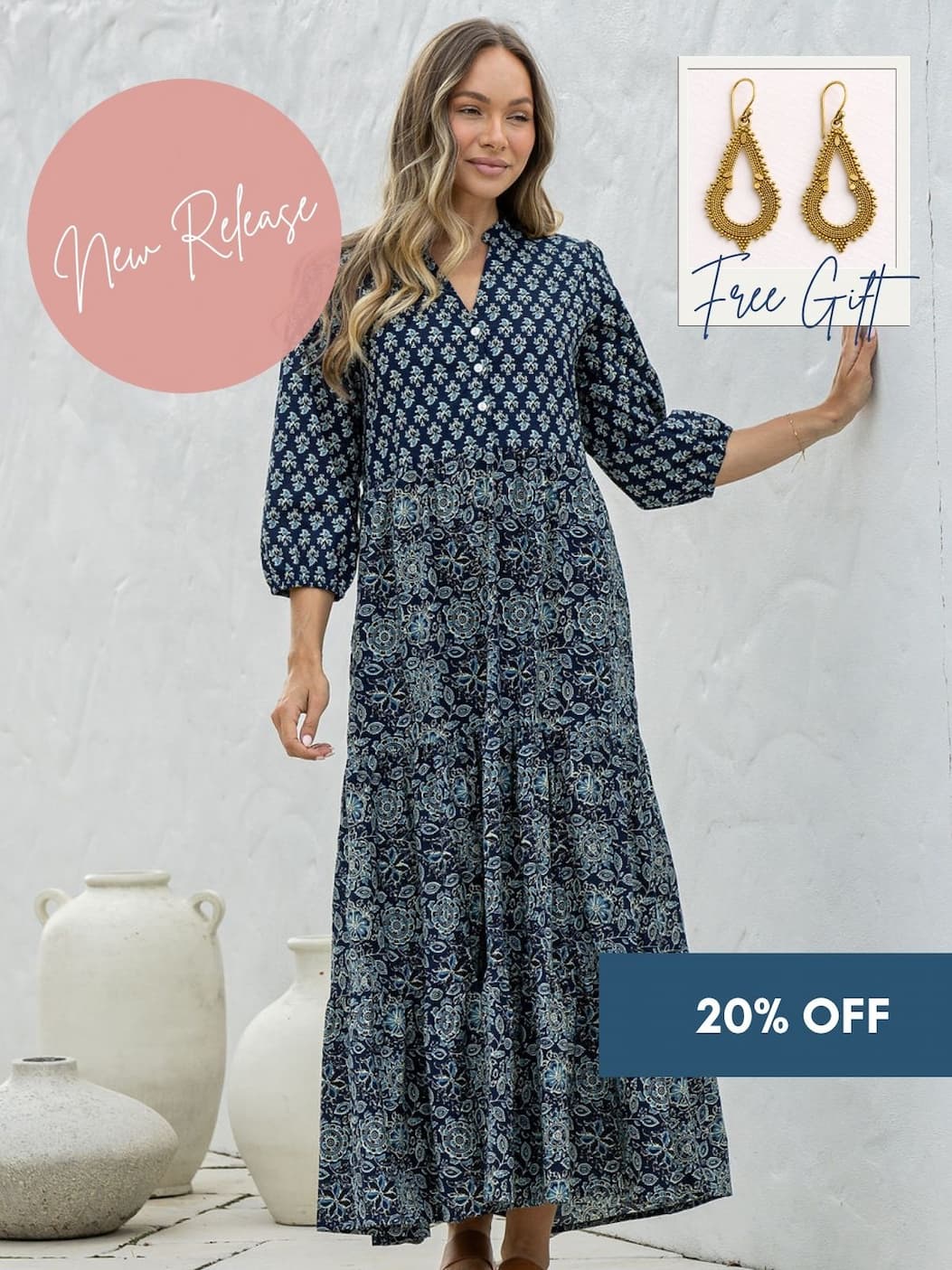 woman in blue and white maxi dress on country pathway