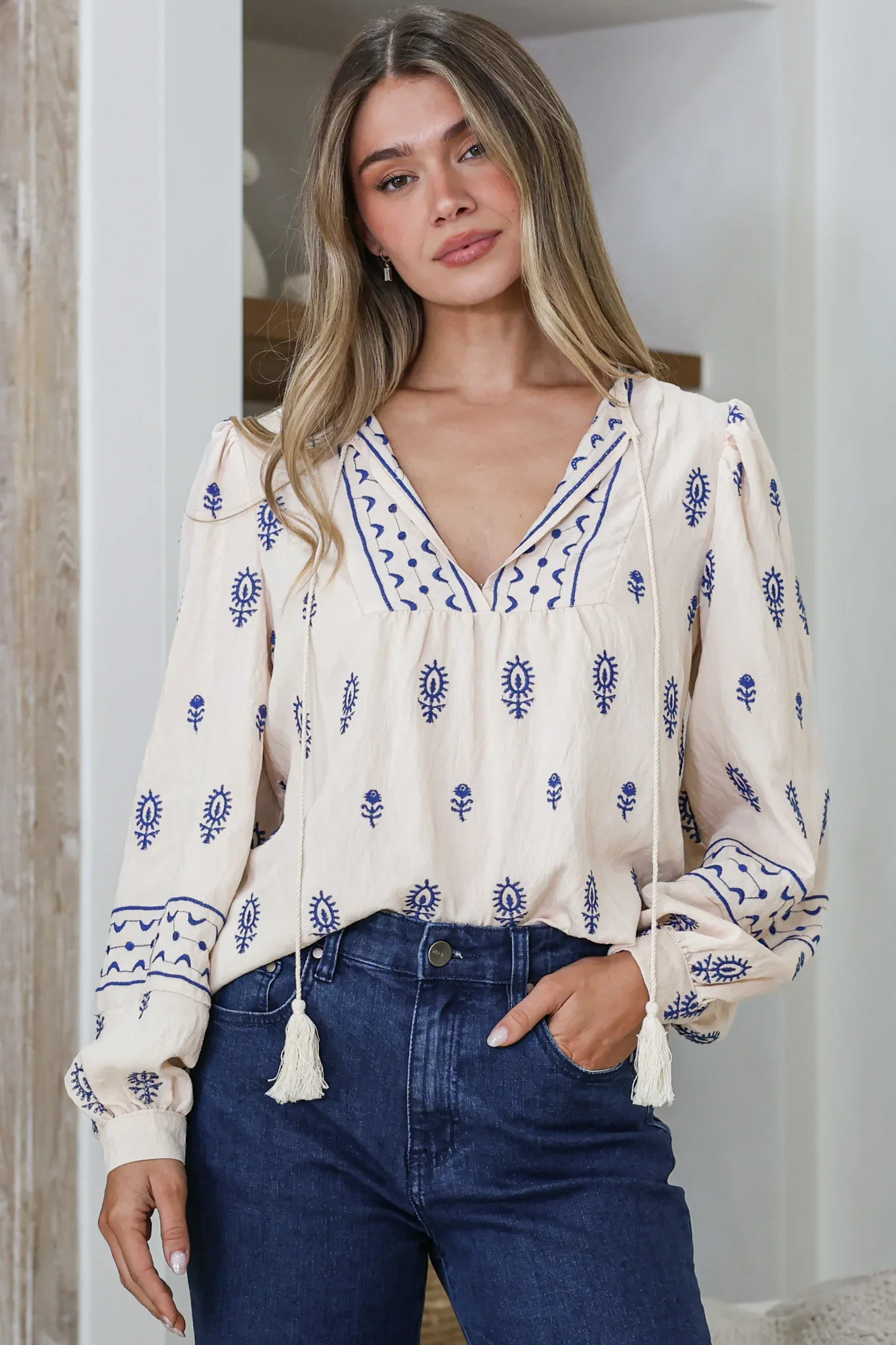 Image of Nouveau Top - V Neck Embroidered Pullover with Long Cuffed Sleeves in Cream