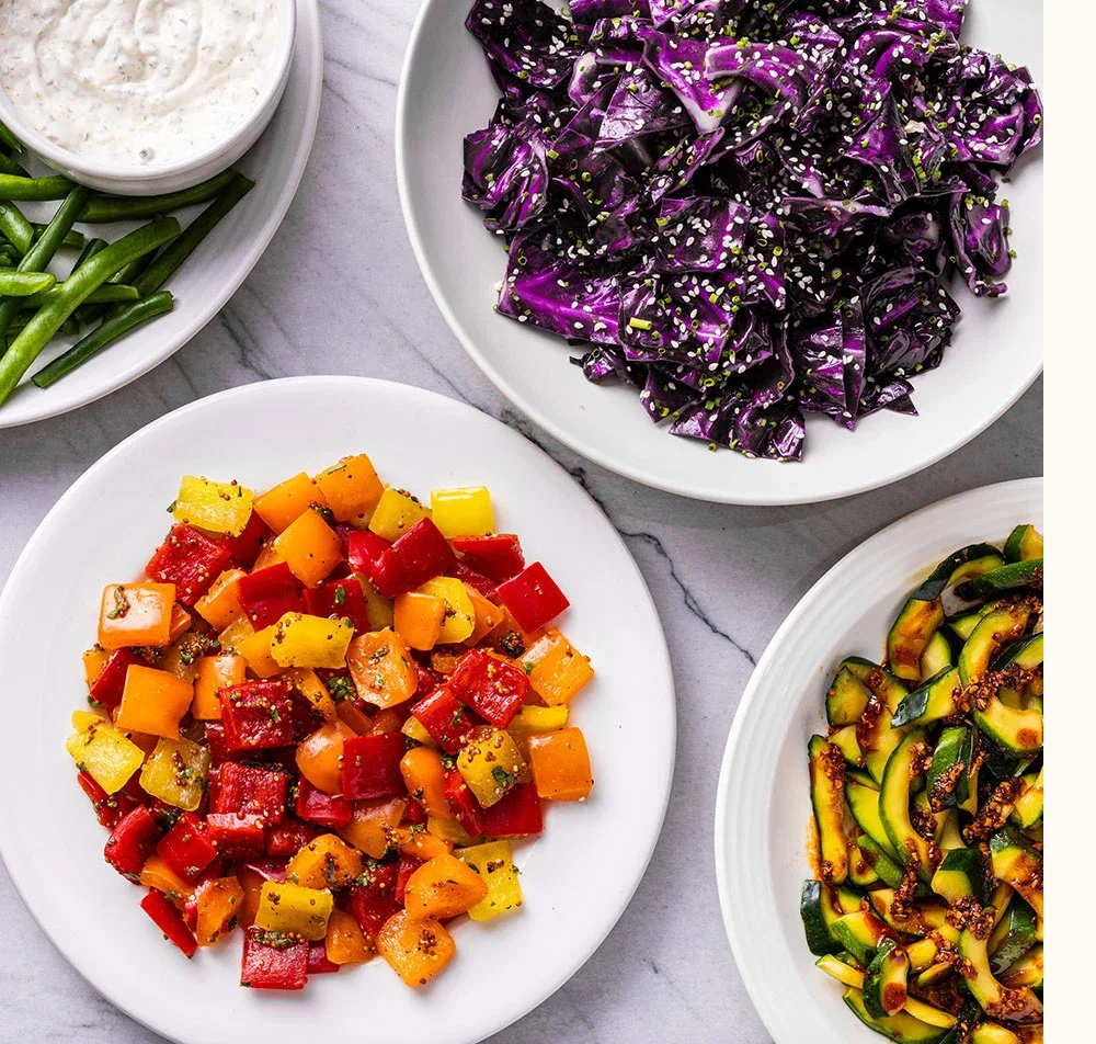 No-cook veggie dishes including cabbage dressed with toasted sesame oil and sesame seeds