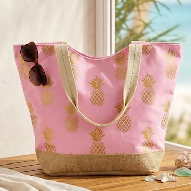 Large canvas tote bag with sturdy handles, styled for everyday shopping, beach days, travel, and summer outings.