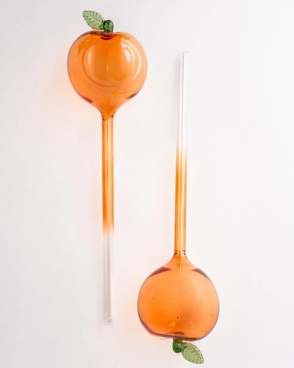 Image of Peach Watering Globes