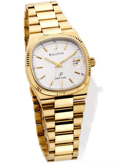 Gold-tone Bulova watch with a silver textured dial, fluted bezel and date window at 3 o’clock.