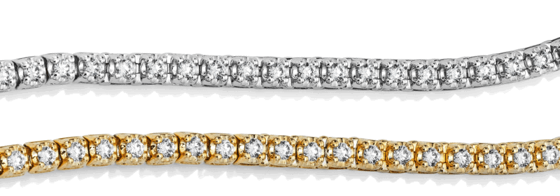 White gold and yellow gold diamond tennis bracelets featuring rows of round brilliant diamonds.