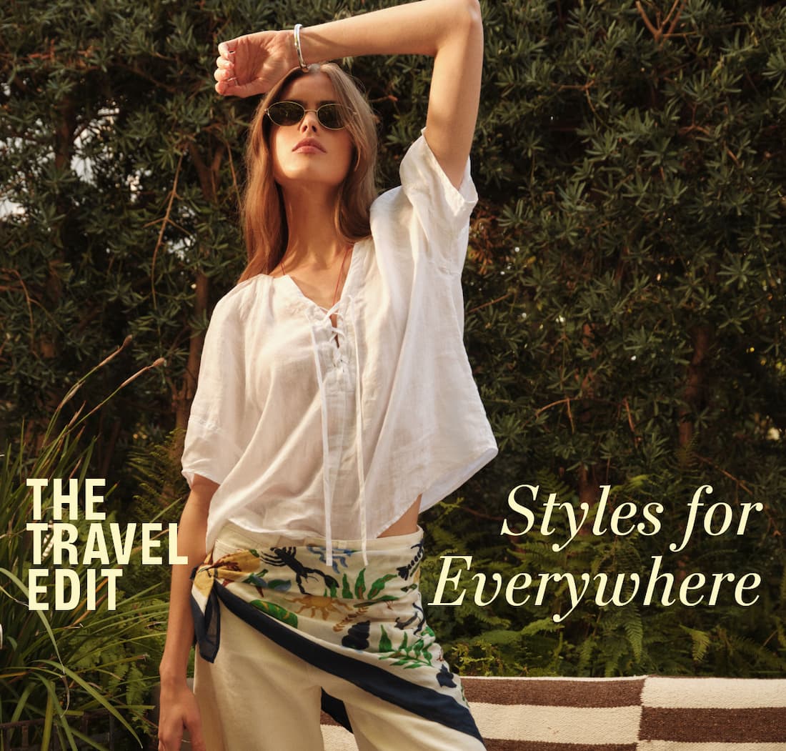 Image shows model wearing the Faeryn Top in White. Text reads: The Travel Edit. Styles for Everywhere