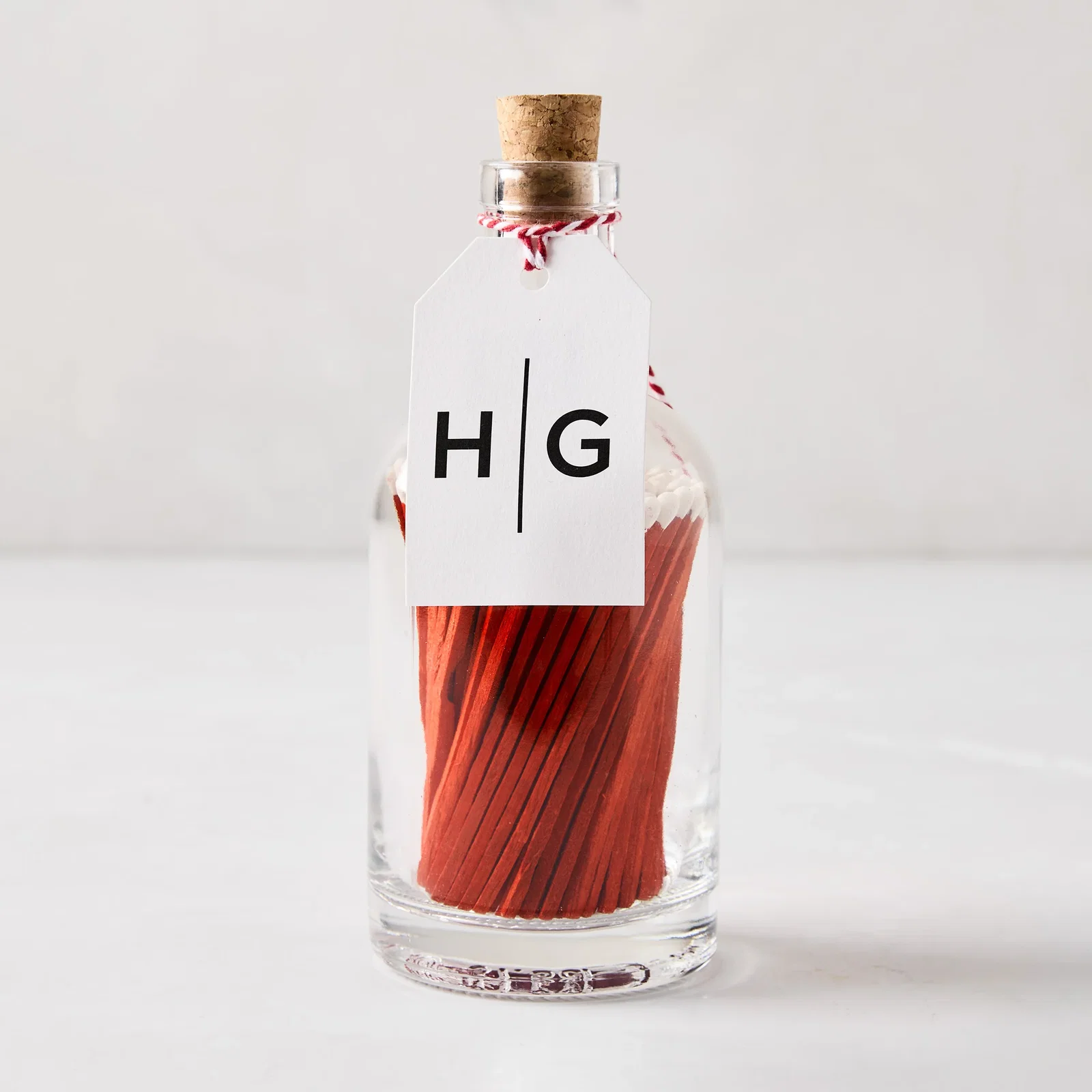 Image of Orange with White Tip Oversized Matches in Glass Bottle