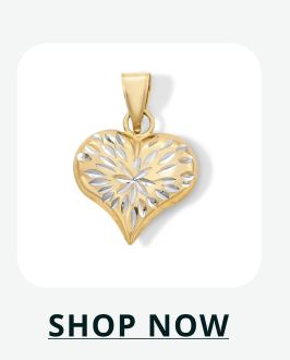 Gold toned heart charm with diamond-cut starburst pattern. Click here to shop now