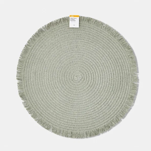 Sage green fringed placemat $1.75.