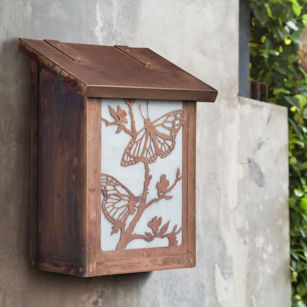 Vertical mailbox with butterfly artwork.
