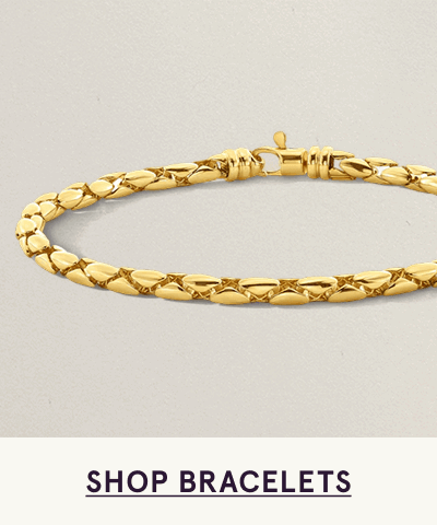 Textured, interlocking gold link bracelet. Click here to shop bracelets