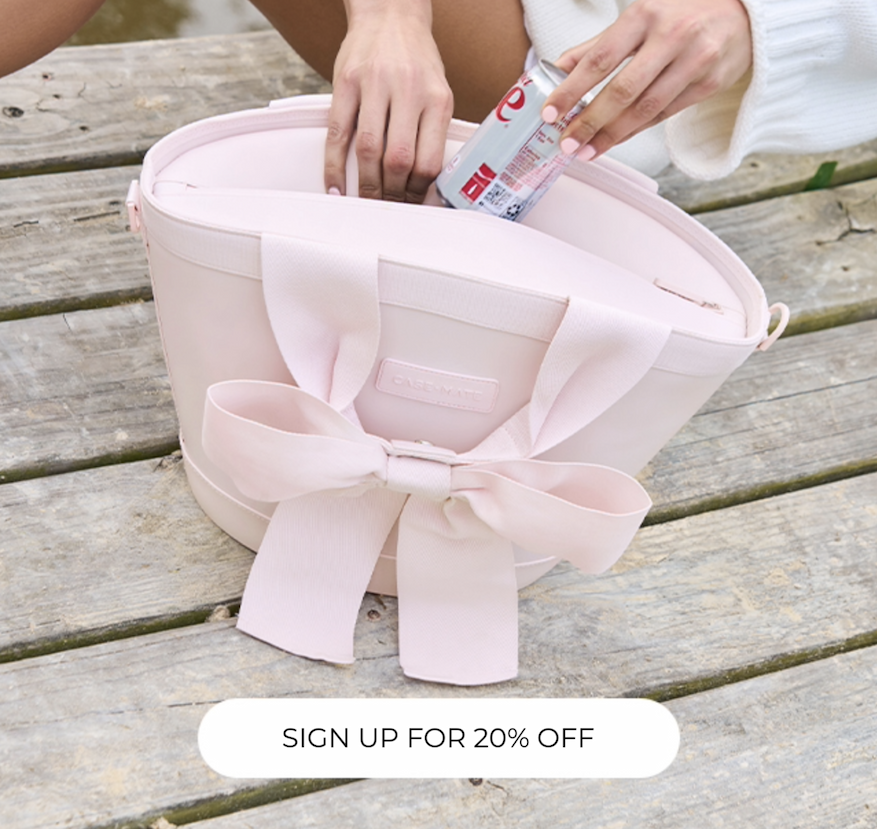 A hand putting a soda can inside the Mini Jelly Cooler Tote (7L).