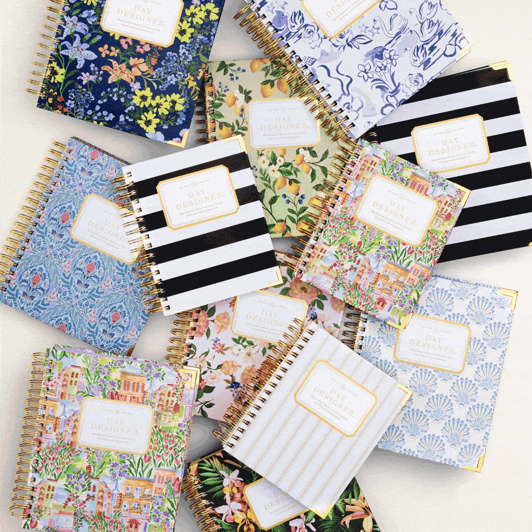 rotating images showing stacked planners in pretty patterns, woman holding gray planner, open book with writing on page, hand holding white pen