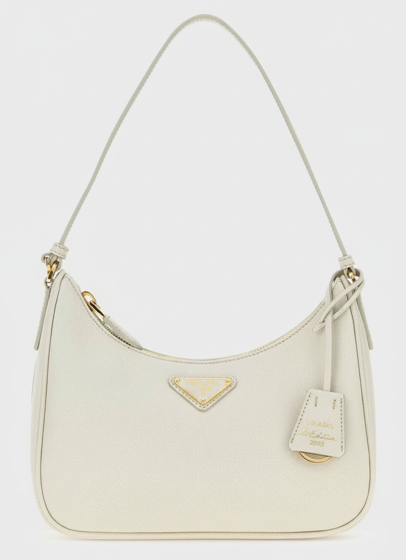 White Prada shoulder bag with gold hardware and a triangular logo.