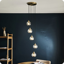 Falloe 5-Light Cascade Pendant in Antique Brass
