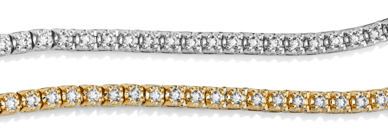 White gold and yellow gold diamond tennis bracelets featuring rows of round brilliant diamonds.