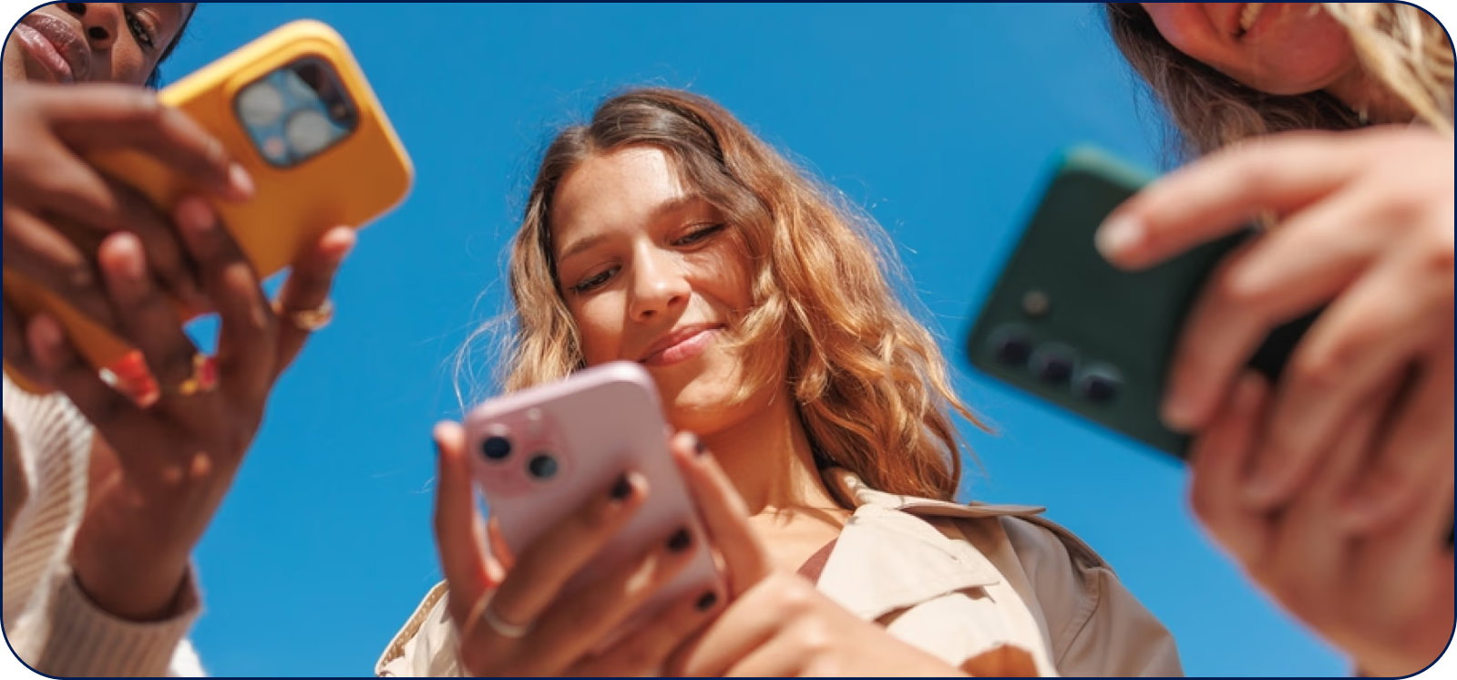 Women holding mobile phones