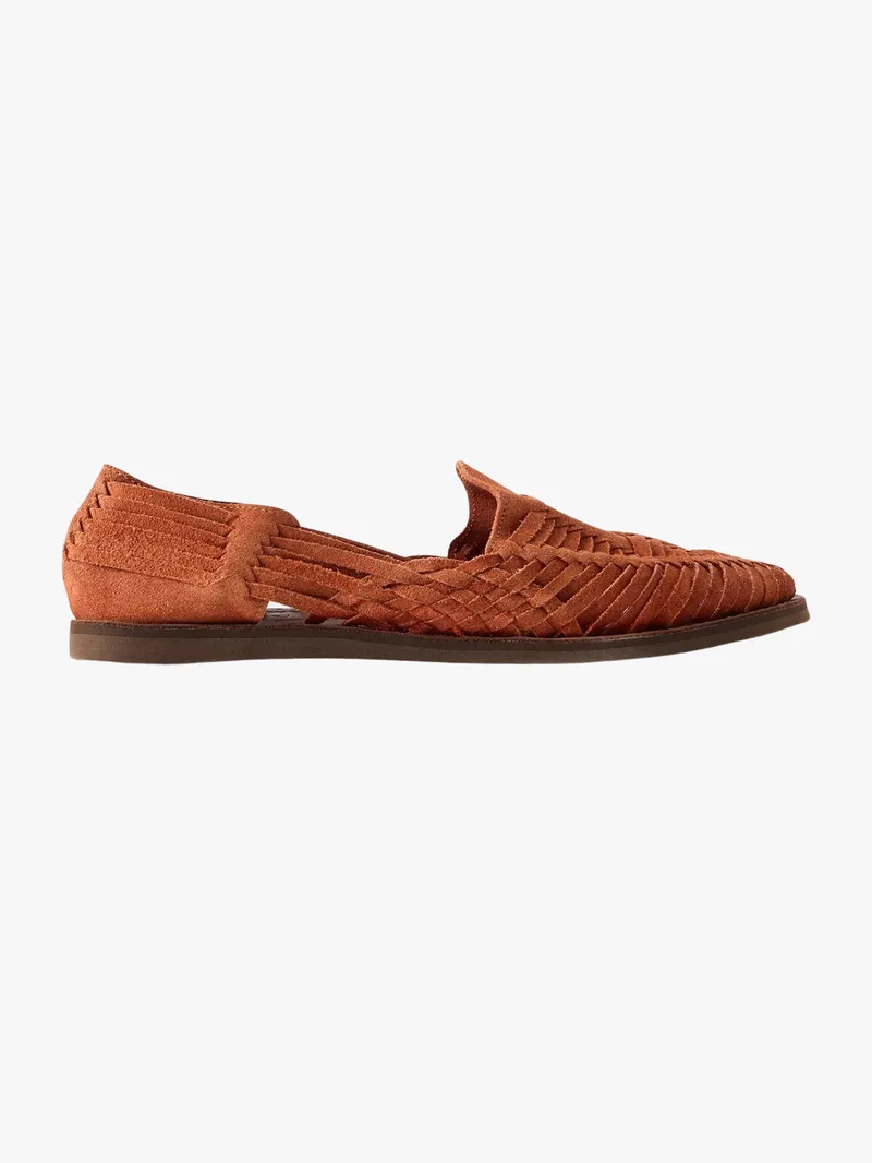 Image may contain: Suede, Clothing, Footwear, Shoe, Sandal, and Sneaker