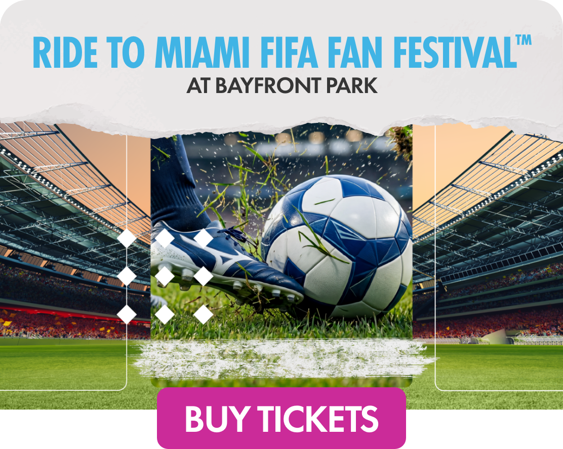Digital banner promoting the Ride to Miami FIFA Fan Festival at Bayfront Park. The central image shows a close-up soccer ball on a grassy stadium field with a player's cleat about to kick it. Stadium lights and stands frame the action, emphasizing a live match atmosphere. Bold text highlights the event location, and a bright magenta button at the bottom reads “BUY TICKETS.”