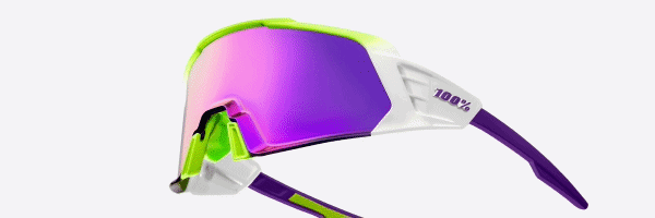 100% Korbin X Fluo Yellow sunglasses floating at an angle, showcasing the full frame with white body, neon yellow highlights, purple arms, and vivid purple mirrored shield lens