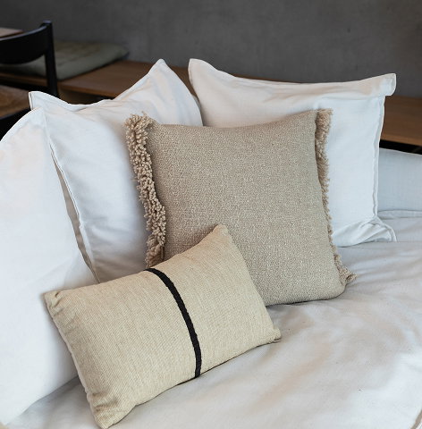Cushion arrangement featuring Whitton cushion