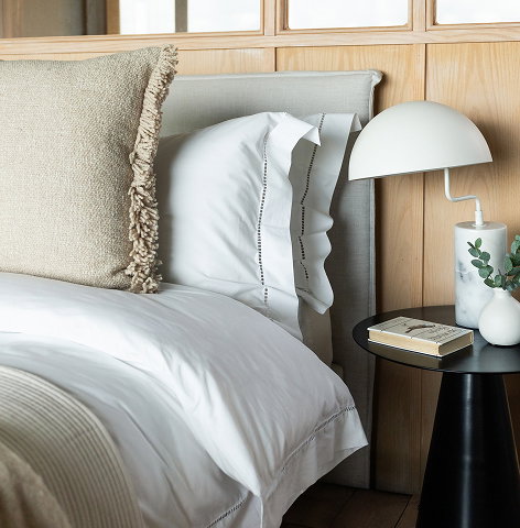 Bed featuring Santorini bed linen collection