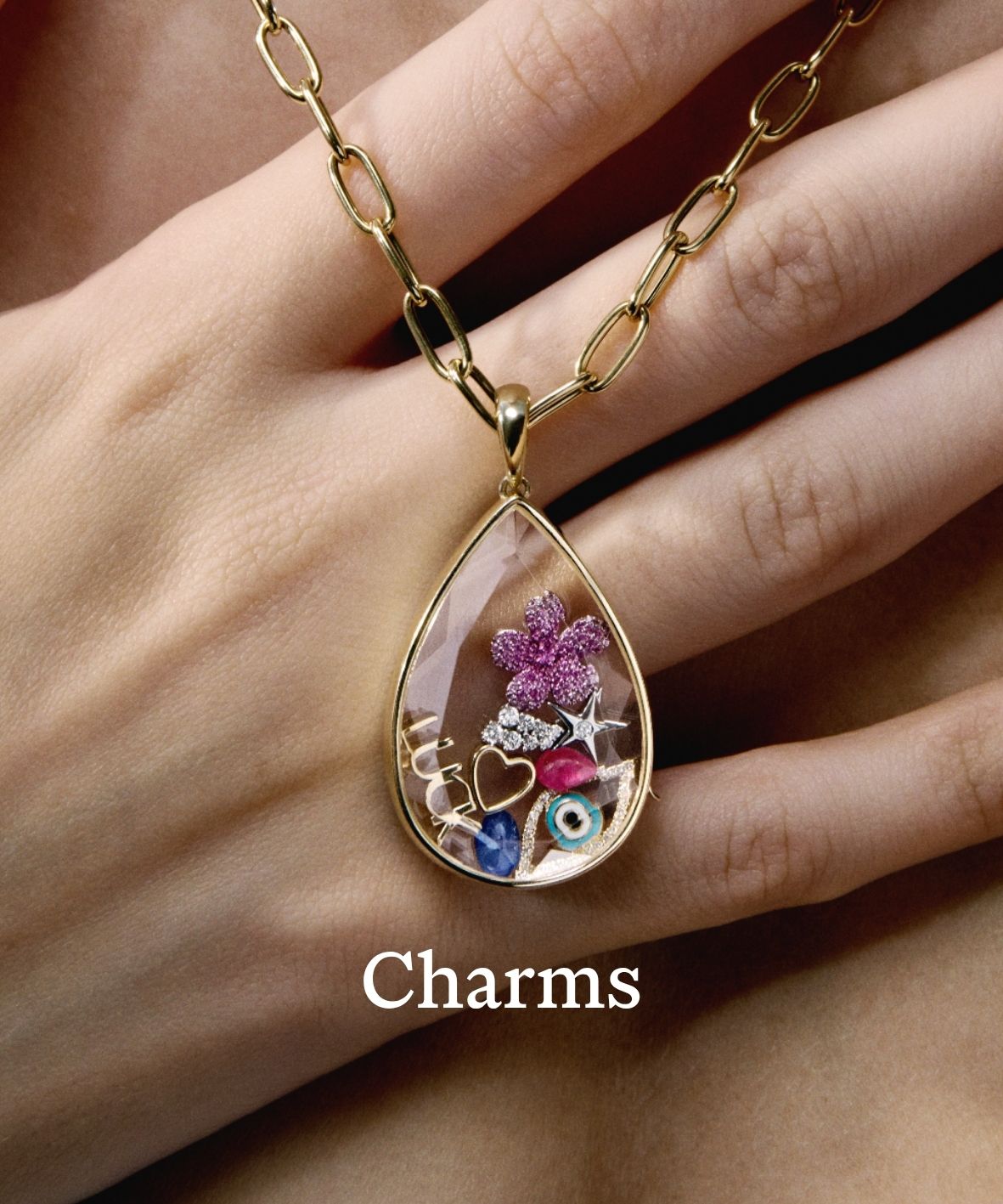 NOVA LOCKET WITH CHARMS ON MODEL