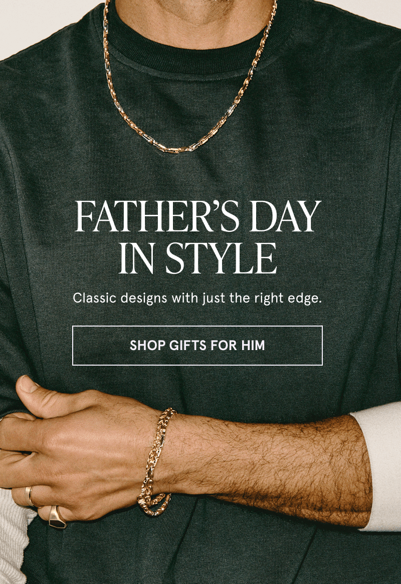 Male with two-tone chain, link bracelets & rings. Father’s Day in style. Click here to shop gifts for him