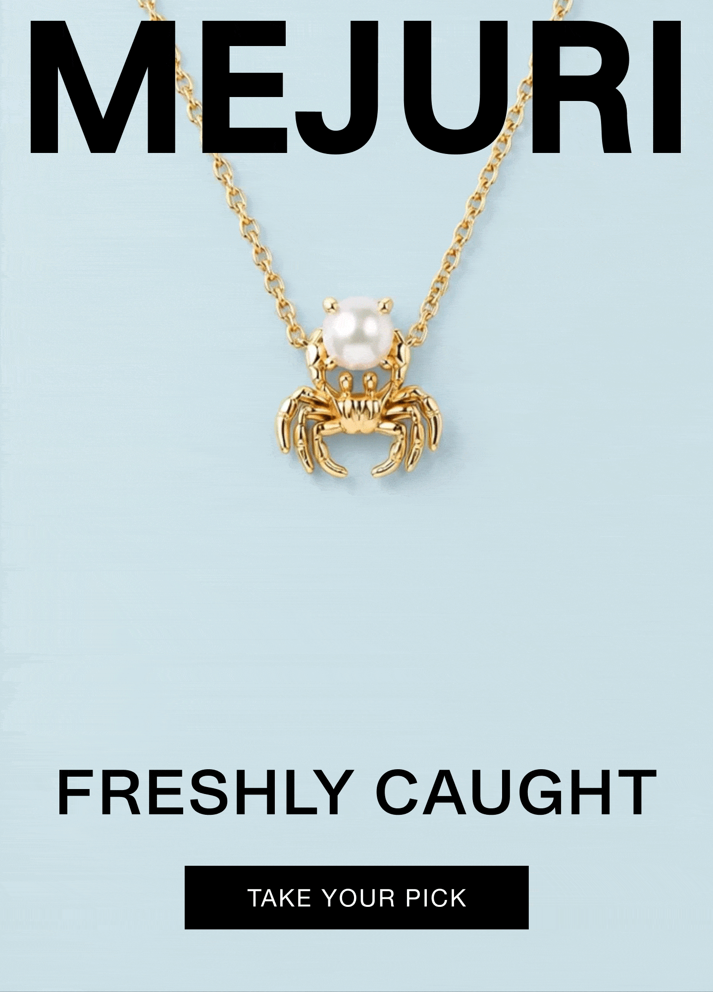 Mejuri gold crab pendant necklace with a freshwater pearl on a light blue background — Mejuri, Freshly Caught.