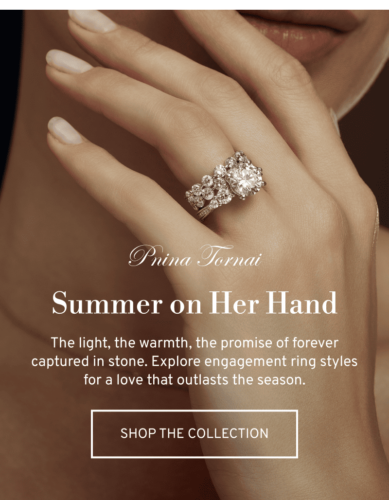 Model wearing an engagement and wedding ring set from Pnina Tornai. For a love beyond summer. Click to Shop Pnina Tornai