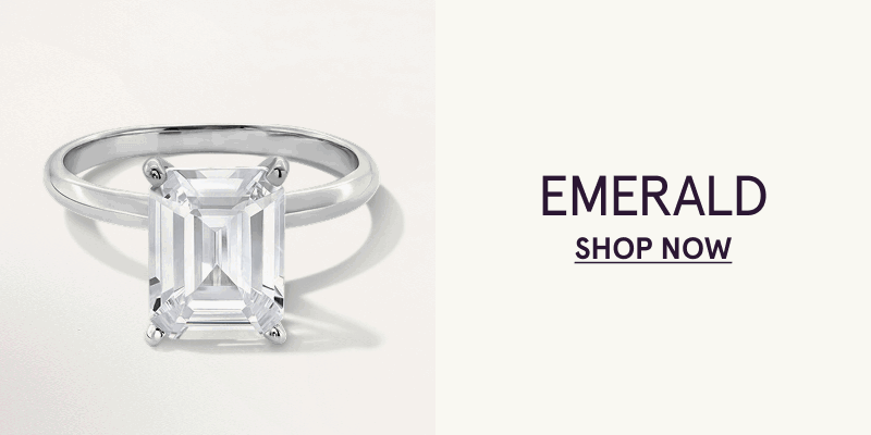 Silver band with rectangular-shaped centered diamond. Emerald. Click here to shop now