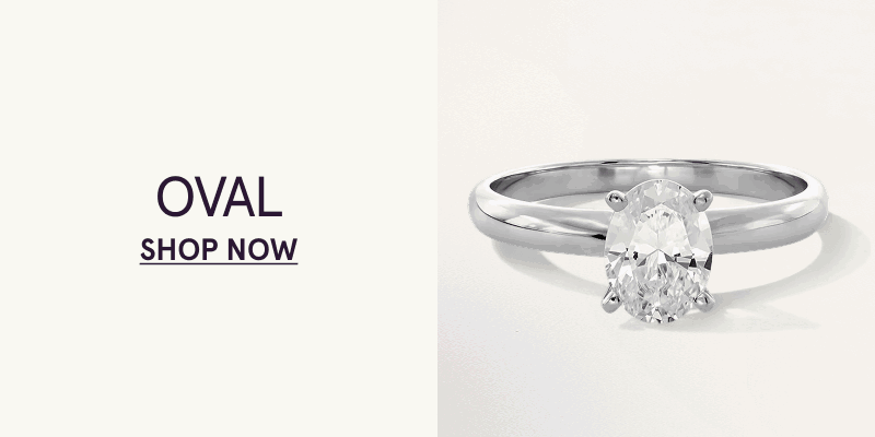 Silver band with oval-shaped centered diamond. Oval. Click here to shop now