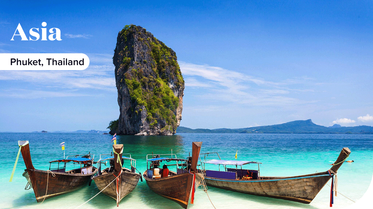 Local boats on the shores of Phuket, Thailand.