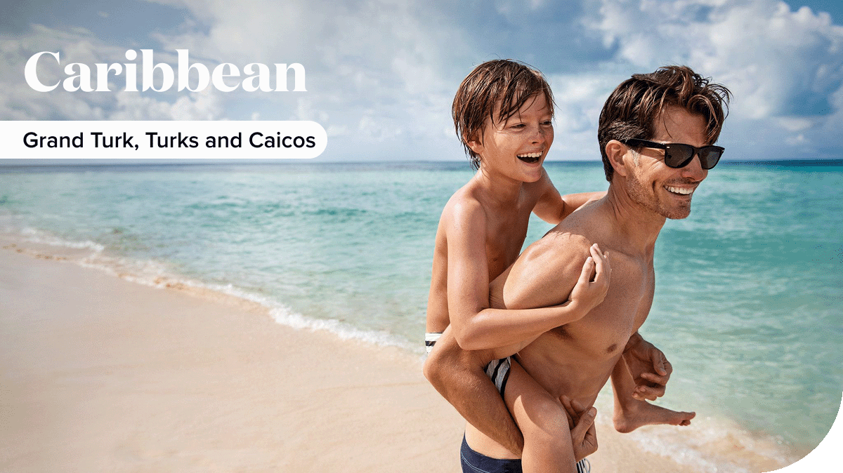 A father and son play in the Caribbean seas.
