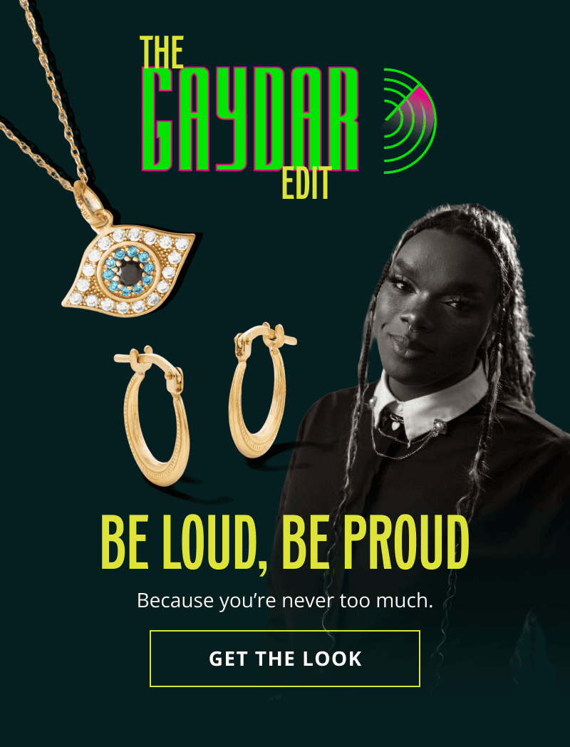 Anania, gold chain with eye pendant,  & gold bubble bar studs. The GAYDAR Edit. Be loud & proud. Click here to get the look