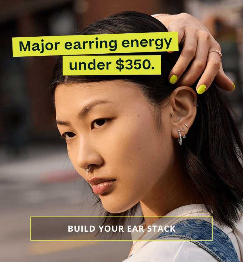 Model with neon nails & diamond geometric ear stack (studs, huggies & hoops.) Major earring energy under $350. Click here to build your ear stack