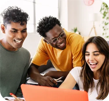 image-colleagues-gathered-around-laptop-laughing