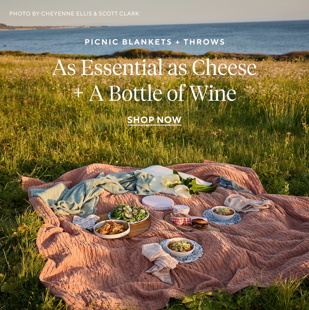 Picnic Blankets + Throws As Essential as Cheese + A Bottle of Wine Shop Now >