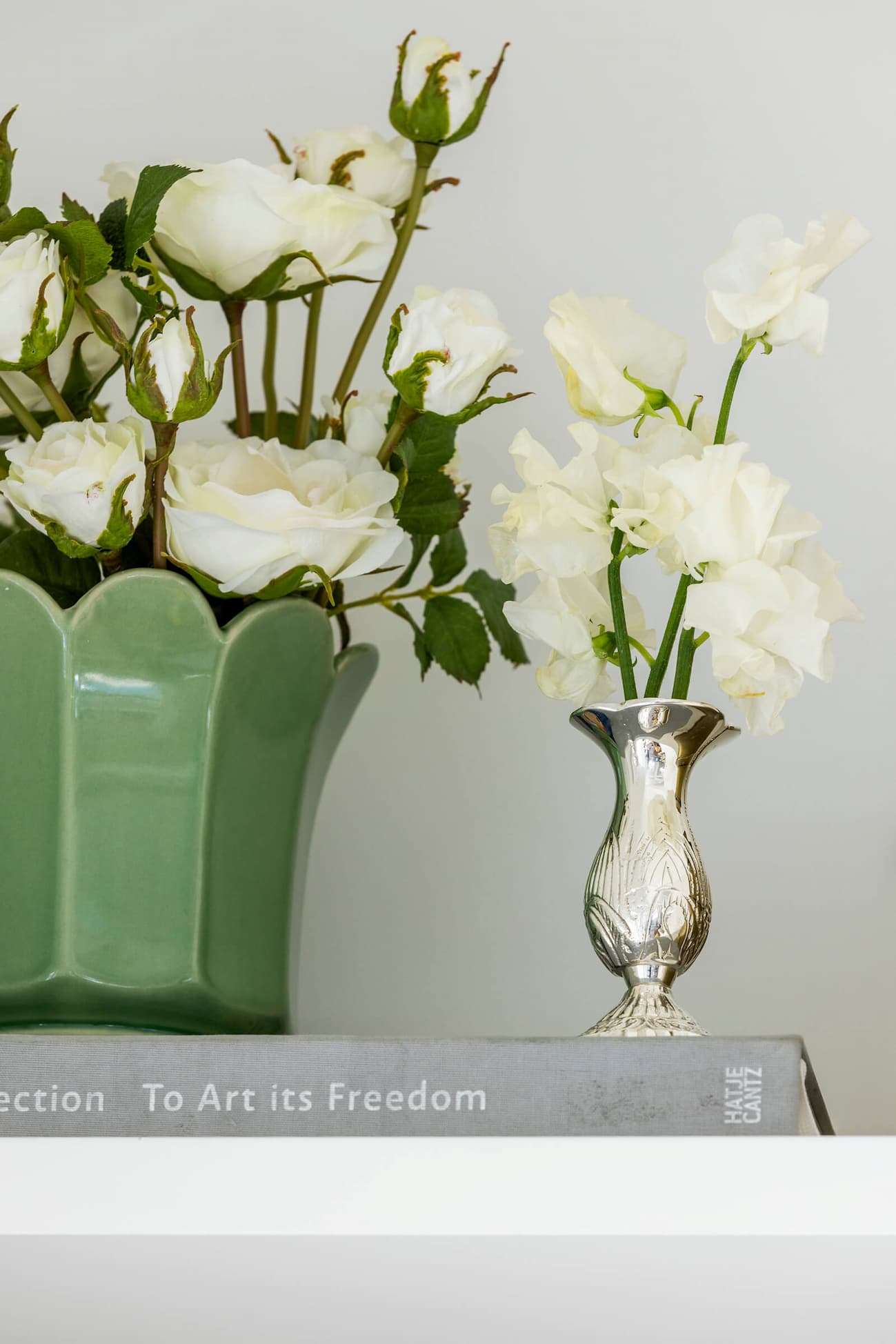 Queen Anne's Vase on shelf next to sage scalloped pot.