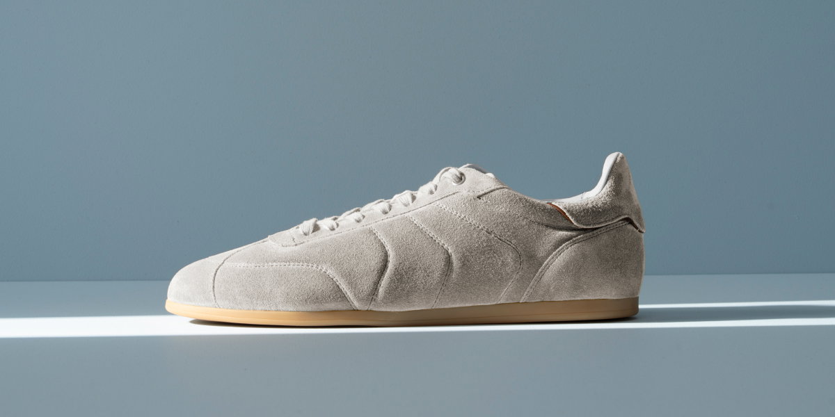 Side View Image Of The Aiden Sneaker In Dove Grey Suede. Click Here To Shop Now.