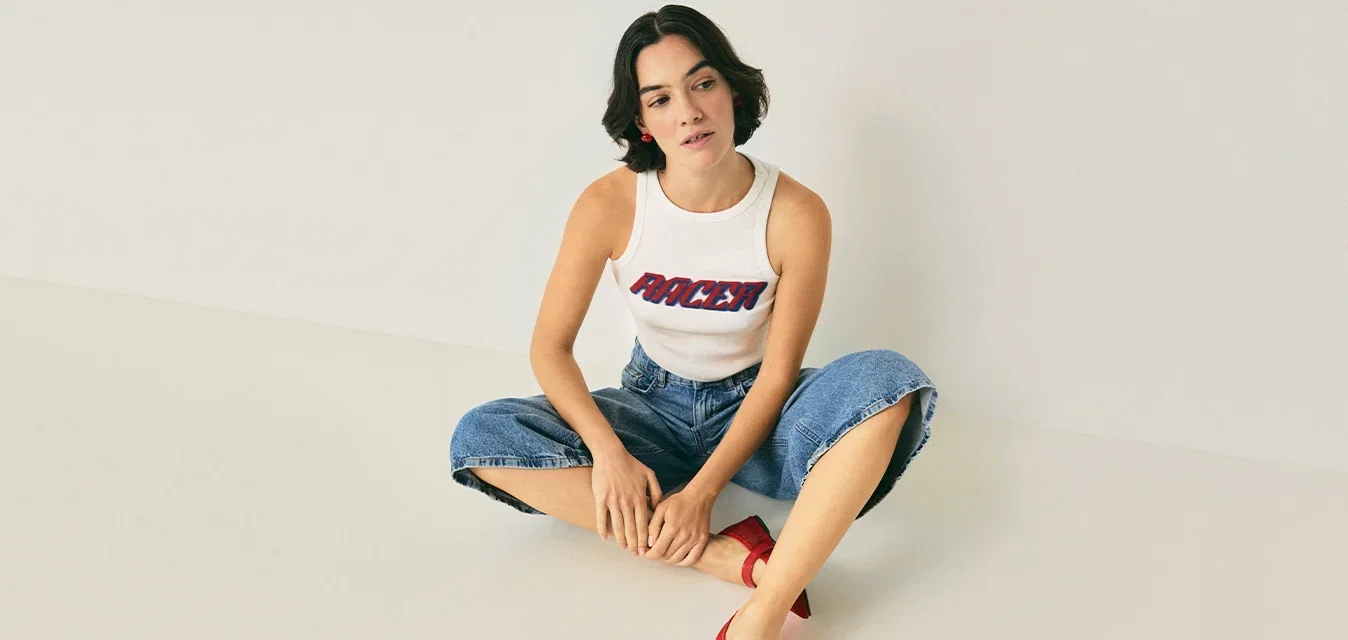 Weisses Tanktop mit dem Text 