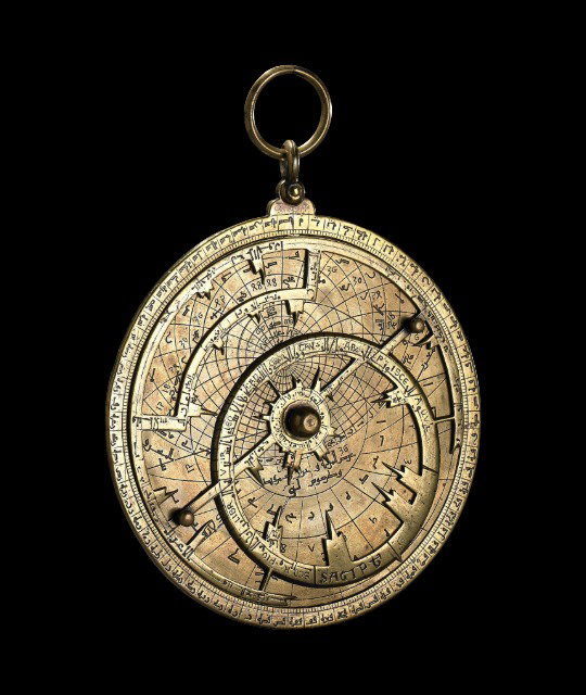 A silver astrolabe. 