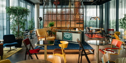 The lobby at Ruby Ella Cologne features '90s talk show vibes.