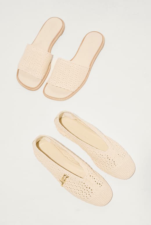 vanilla colored crochet slides and ballet flats with gold charms
