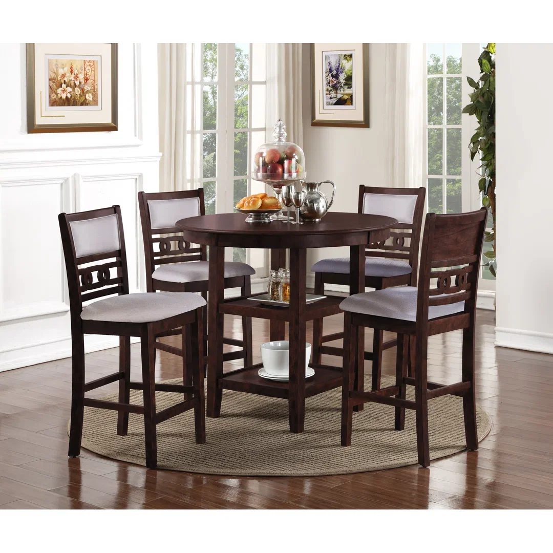 Ziemer Jackins 4 - Person Round Solid Wood Dining Set