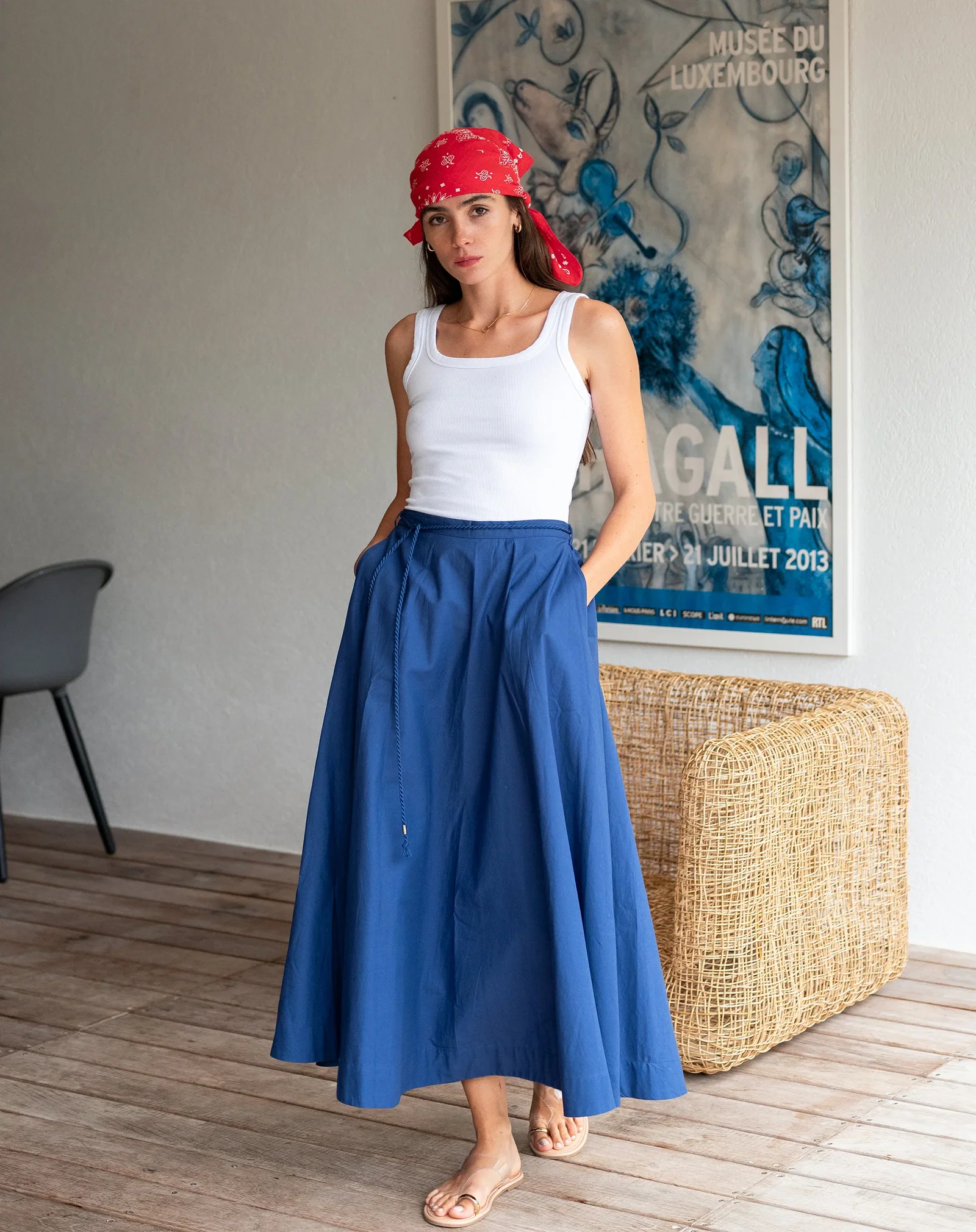Image of a woman wearing a blue maxi skirt