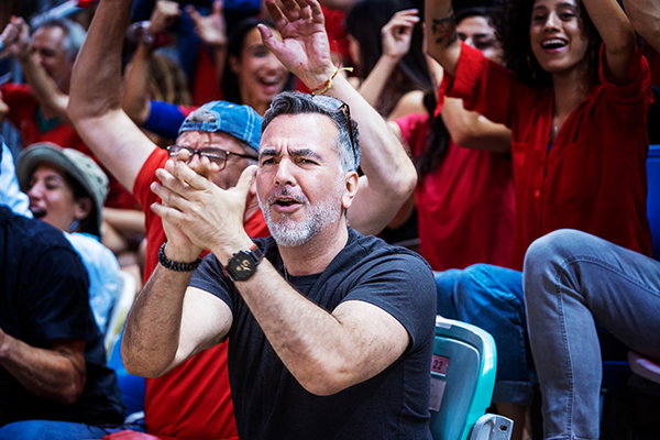 Sports fans celebrating.