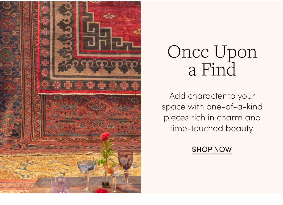 Vintage rugs with a vintage coffee table and glassware