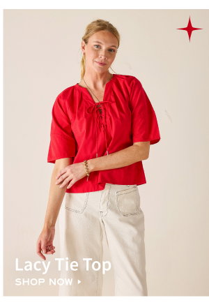 Lacy Tie Top - Shop now - Image of a woman wearing a red short sleeve top with lace-up detail.